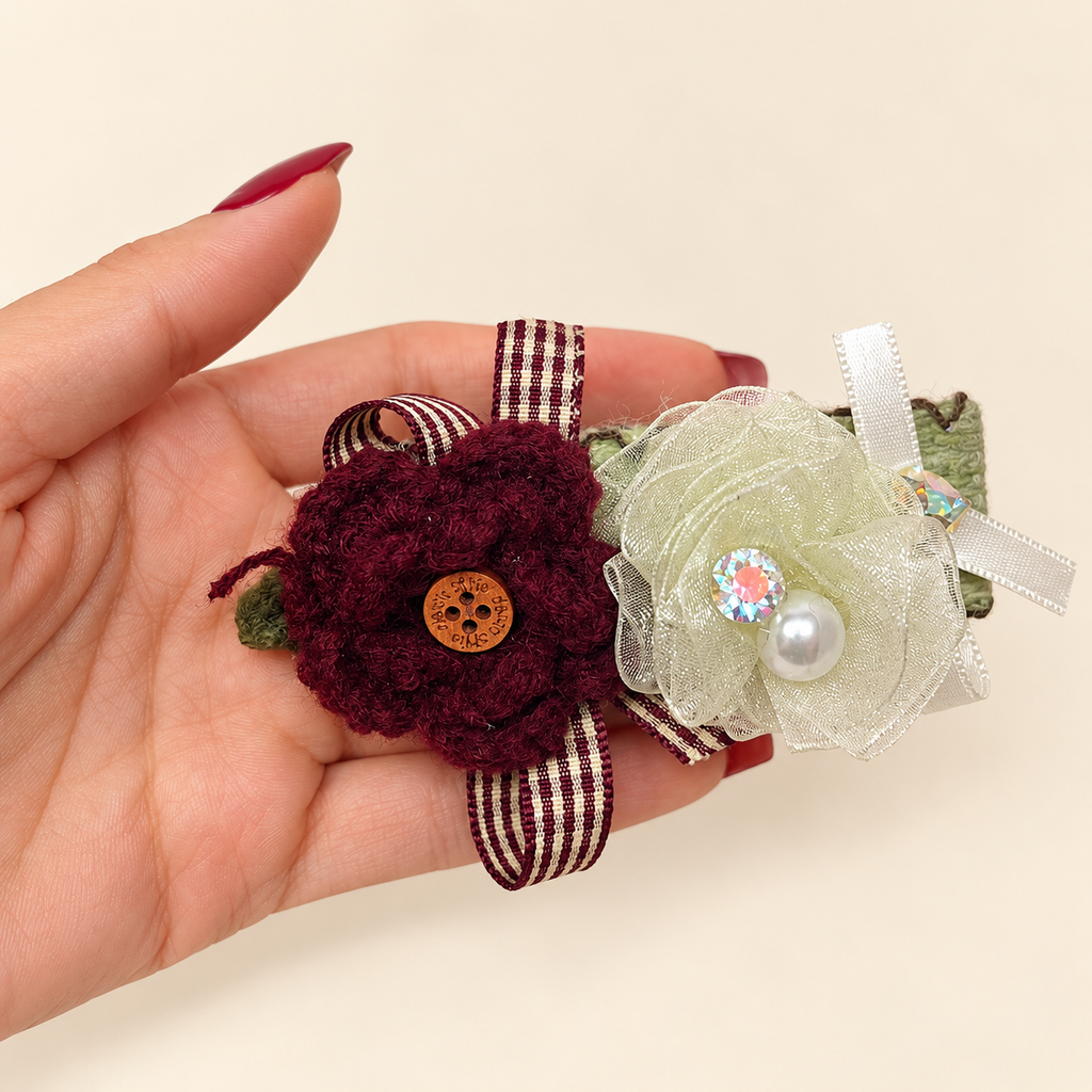 Handmade burgundy yarn flower and sheer ivory flower hair clip with striped ribbon and pearl-style bead